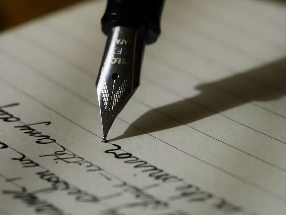 Writer drafting search-optimized website and blog content for a content writing strategy